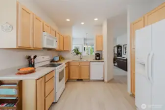 Corian countertops and LVP floors.