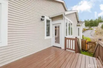 Deck has stairs to the backyard.