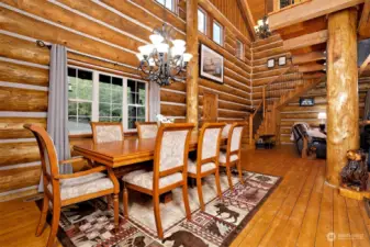 flowing wood floors throughout the home. The timber in this home is extremely impressive!