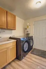 Laundry room with on-demand HWH