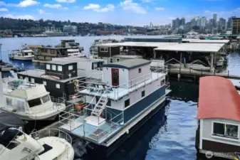 Knot Home is a 2009 built houseboat located at 2040 Westlake Ave N in an end slip on the dock.  Knot Home is a registered City of Seattle houseboat with a FOWR plaque #731.