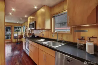 The hardwood floors are throughout the houseboat on the first floor.