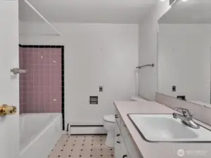 Full bath in daylight basement level.