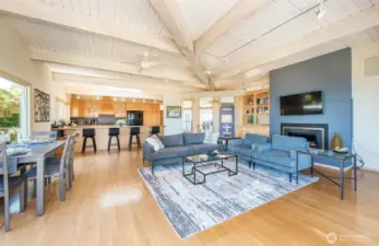 The light filled room is open and flows smoothly from living space to kitchen.