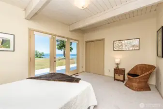 Wake up to water views and watch the deer play in the yard from bed in the primary bedroom!