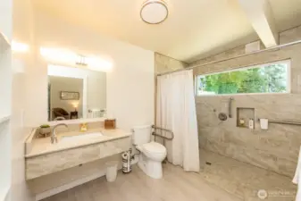 Recently remodeled, this bath is very handicap accessible, stylistically simple, but also gorgeous.