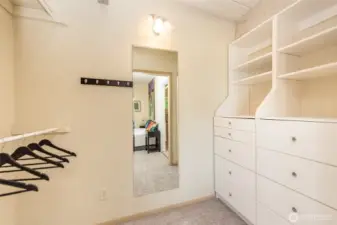 Built in storage in the primary walk-in closet