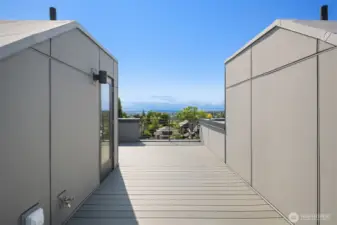 Rooftop deck with sweeping views complete with power, gas, and water.