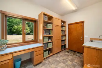 Amazing mudroom/pantry off entry area.  Door leads to oversized three car garage that has huge attic storage area.