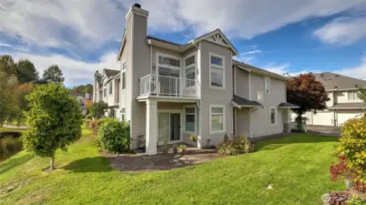 Enjoy serene, top-floor living in this private end unit retreat.