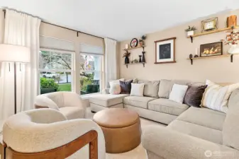 Formal living room just off the entryway offers an inviting first impression.