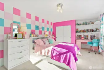 Large upstairs bedroom features a recessed nook, perfect for a desk or study area!