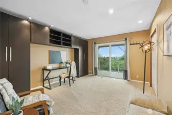 2nd Level - Bedroom 4 - also great office space.  Built in organizer with overhead lighting stays.  Bi-fold door closet and access to deck.