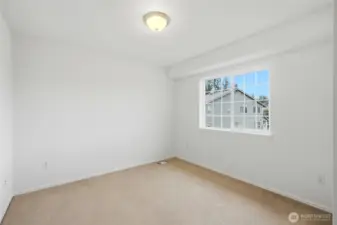 Secondary bedroom filled with natural light