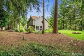 Situated on a corner lot, this property provides both privacy and the benefits of the neighborhood community. Native plants and trees provide the true PNW experience.