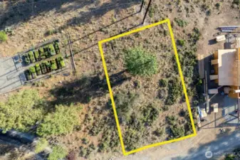 Rendered outline not a survey is an overview of this 7,536 square foot Lot. Next to community garden compound.