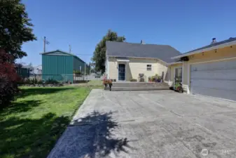 Looking past your 2 car garage towards you deck and RV storage.