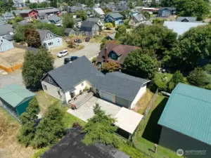Ariel view looking at the back yard and 2 car garage.