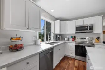 Quartz countertops, and great flow to this kitchen