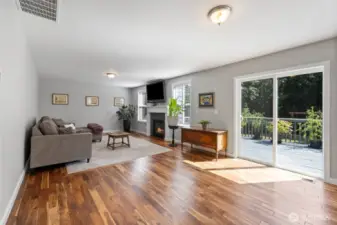 Room for kitchen table, beautiful Acacia wood floors.
