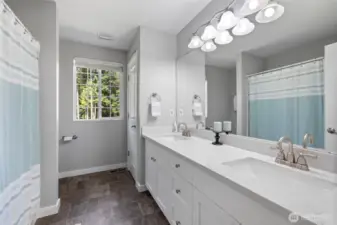 Full guest bath with dual vanities