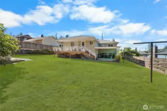 Huge, fully fenced yard perfect for entertaining & enjoying!