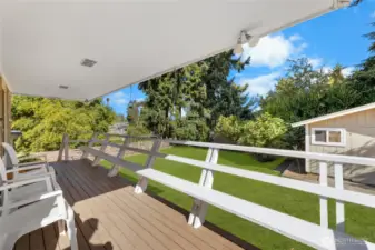 This deck off the bonus room looks out to a very private backyard