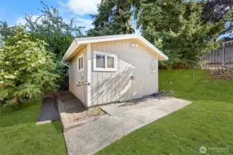This large shed stays with home