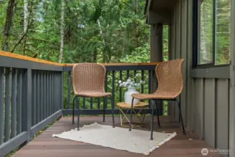 Morning coffee or evening cocktails—this deck is the perfect spot to relax among the trees and birds.