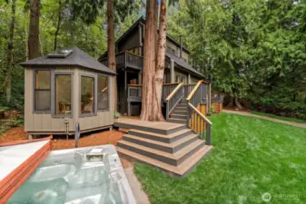 A large, newly landscaped yard perfect for play, entertaining, or relaxing.