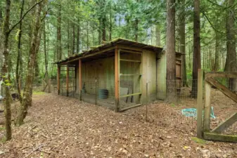 A large chicken coop and charming little barn make this property ideal for a hobby farm.