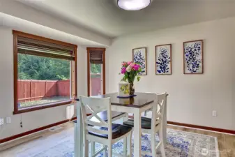 Generous dining area with plenty of space for family meals and entertaining.