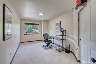 Flexible bedroom #1 currently set up as a home office—perfect for remote work or study
