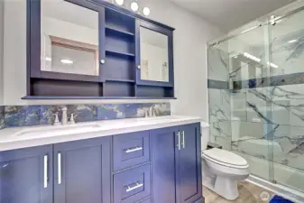 Upgraded modern features in this Primary Bath