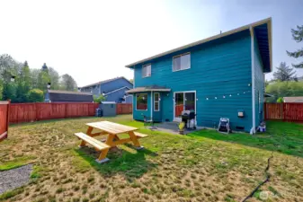 BBQ and Entertaining overlooking  this large level yard