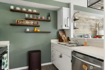 Super cute kitchen with newer stainless steel appliances