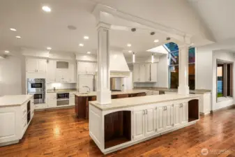 The kitchen also features Double whirlpool microwaves & sub-zero refrigerator and freezer.