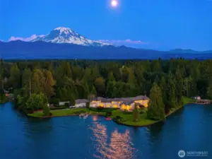 Bulkhead surrounds property w/Mature landscaping.