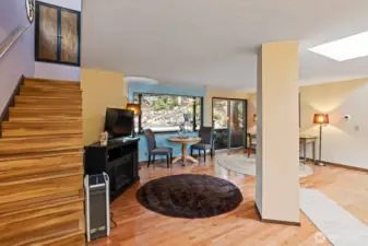 Staircase to the upper floor & the forest in the distance ..