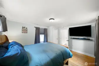 Another view of the primary bedroom.