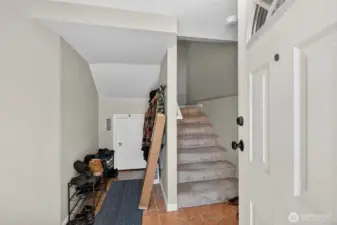 Stairs from front entrance, Garage on the left