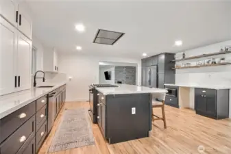 Brand-new gourmet chef’s kitchen w/ premium finishes, quartz counters, huge island & large eat-in space.