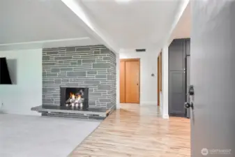 Foyer opens to a spacious living room & a brand-new gourmet chef’s kitchen w/ premium finishes, quartz counters, huge island & large eat-in space.