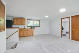 Upstairs private guest quarters w/ 2 bedrooms, great room, micro kitchen & 3/4 bathroom.