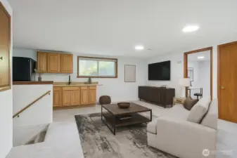 Upstairs private guest quarters w/ 2 bedrooms, great room, micro kitchen & 3/4 bathroom. Virtually Staged.