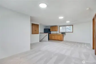 Upstairs has bonus room, mini kitchen, 2 bedrooms and 3/4 bath.