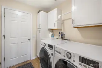 Laundry Room with white cabinetry and LG Washer and Dryer