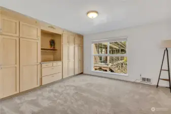 Large primary bedroom with built-ins.