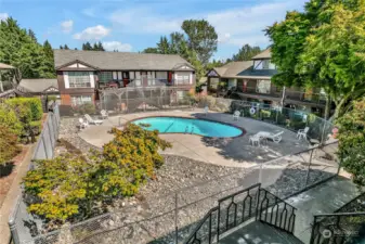 Looking out from a roomy Balcony to Pool.