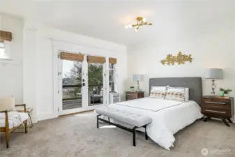 Upper level bedroom also has French Doors onto a private deck.